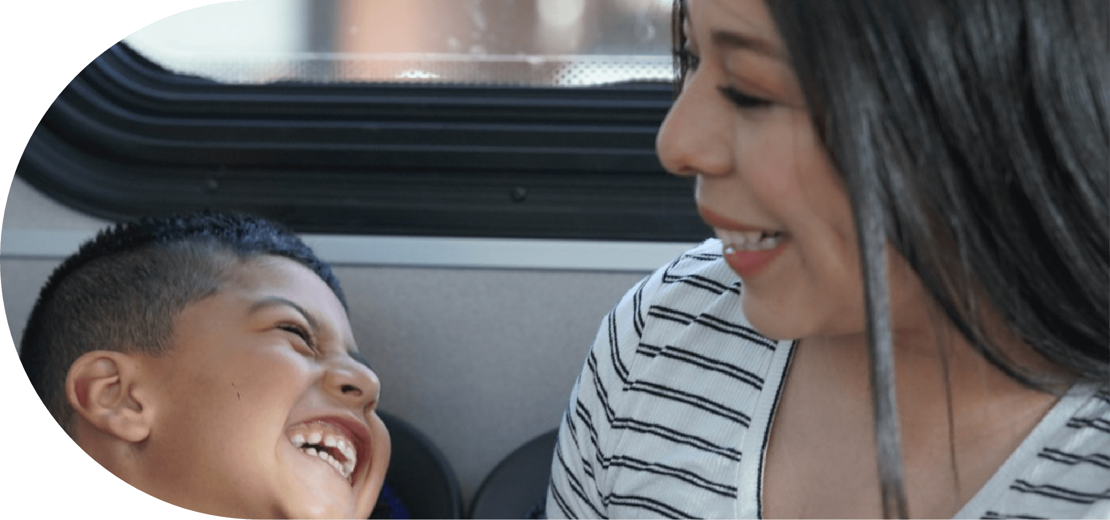 woman and child enjoying a ride on a connect transit bus